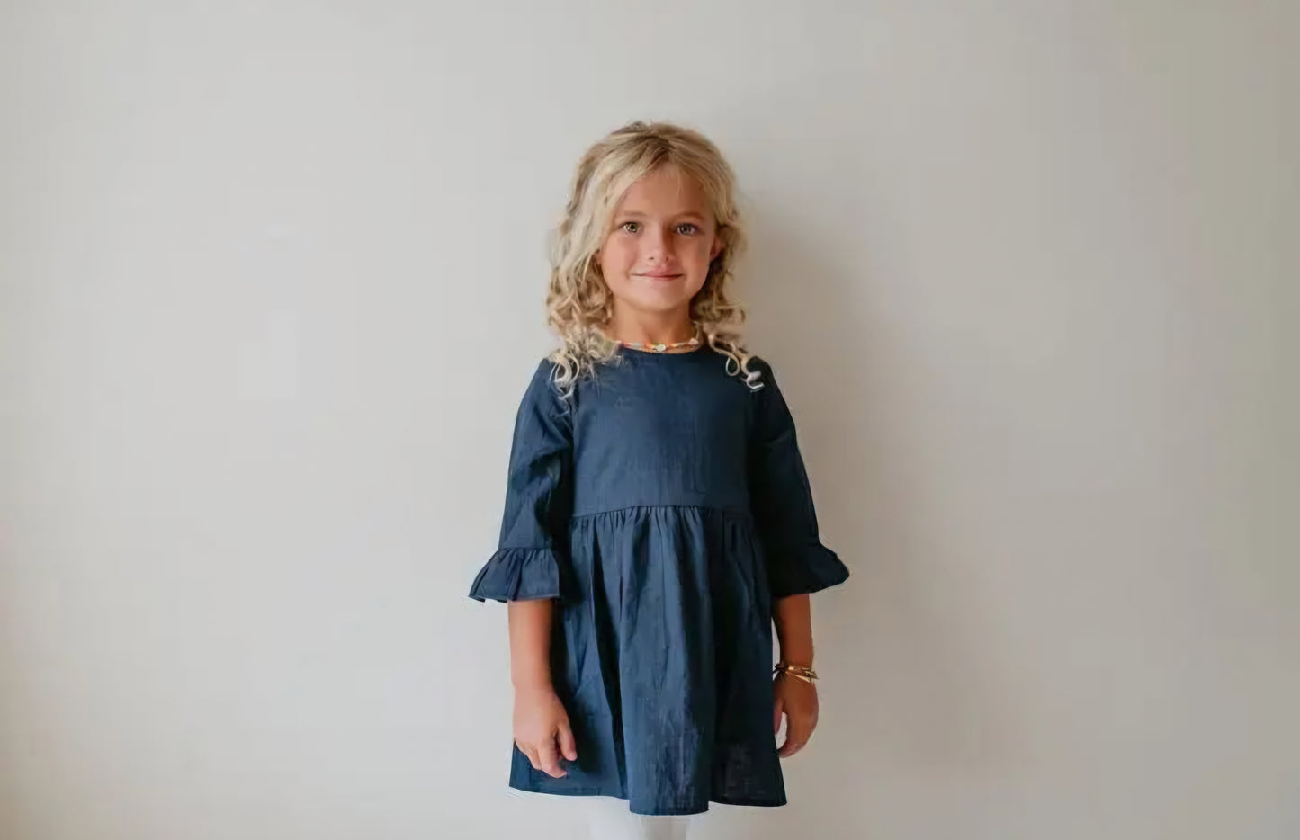 Navy Ruffle w Buttons